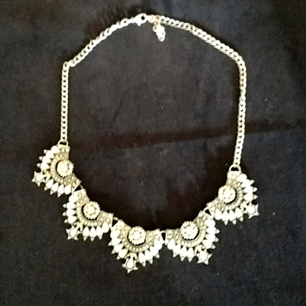 Silver and black toned metal necklace with rhinestones